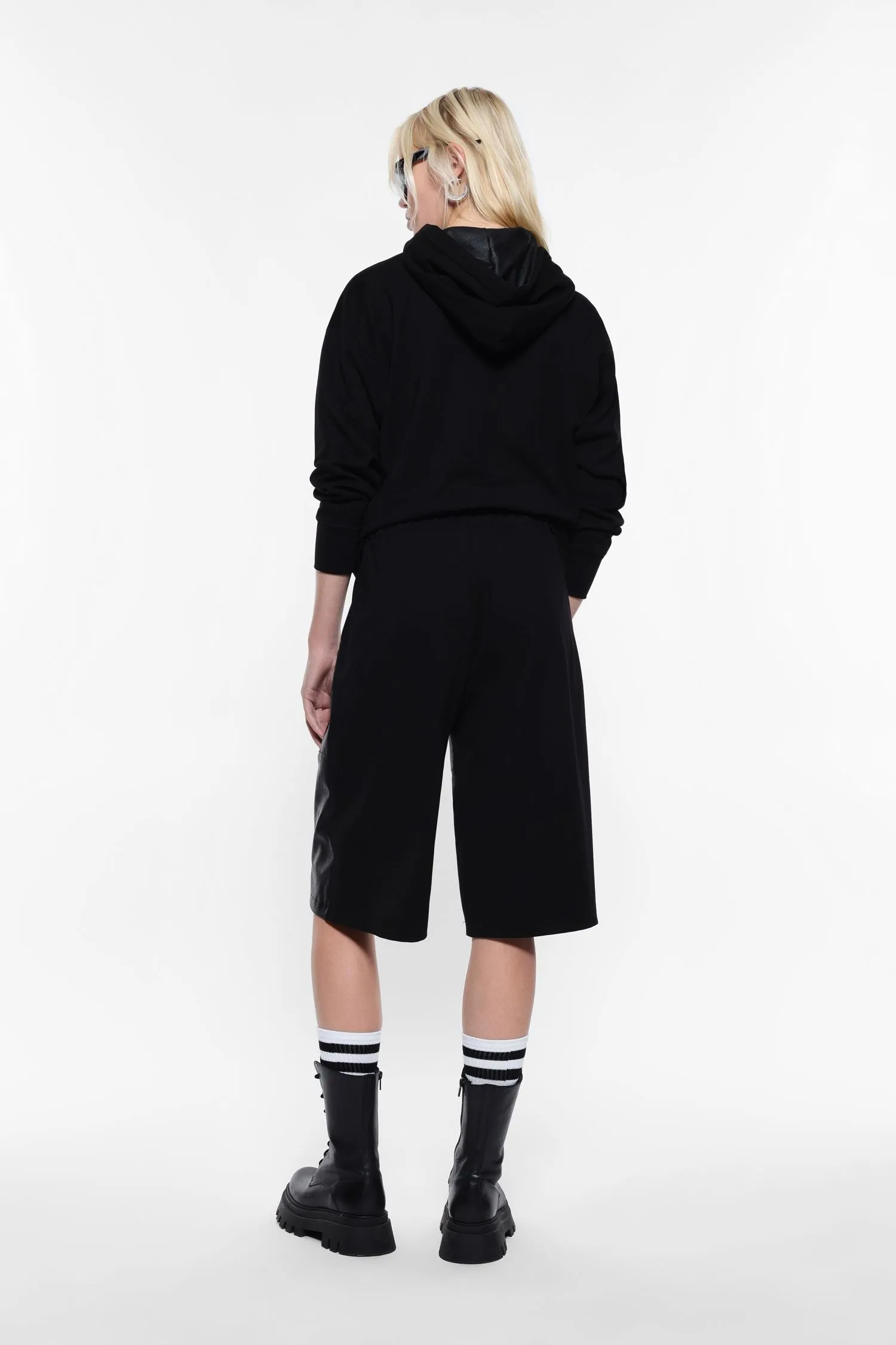 Knee-length shorts in faux leather and fabric